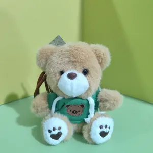 Cute fluffy teddy bear pendant plush toy wearing green hoodie detail showcase for bag or keys