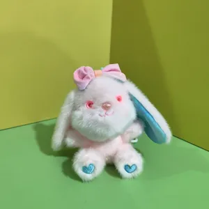 Niedlicher Plüsch Hasen Anhänger mit rosa Schleife, weiche Stofftier Puppe als Taschen Deko.