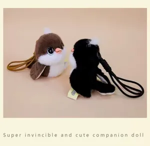 Cute plush bird keychain pair, soft stuffed animal pendant for bags and keys. Fluffy design.