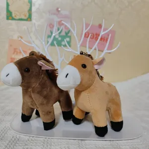 Cute plush horse keychain detail shot, soft toy pendant for bags and keys, brown pony plush.