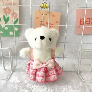 Cute white plush bear keychain detail display shot, featuring a sweet pink plaid dress ornament.