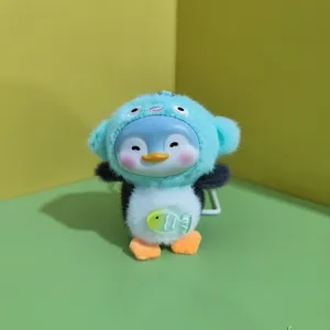 Cute plush penguin pendant doll keychain, soft stuffed cartoon bag charm accessory for daily decor.