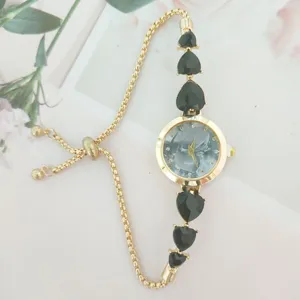 Elegant women quartz watch with gold chain strap and black heart rhinestones for daily wear