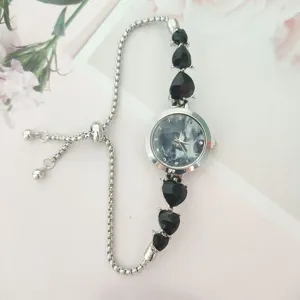 Women fashion quartz watch with black heart charms and adjustable silver slider bracelet strap
