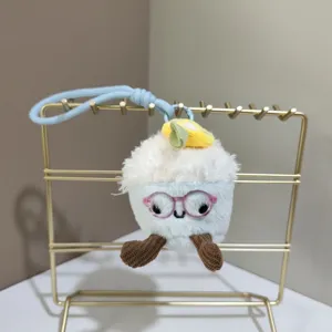 Cute plush ice cream pendant toy with glasses, soft hanging charm for bags and keys.