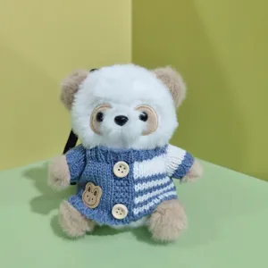 Cute panda plush keychain detail view showing the knitted sweater and buttons clearly.