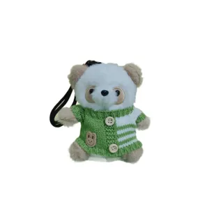 Cute plush panda keychain toy with green knitted sweater, perfect bag charm and gift.