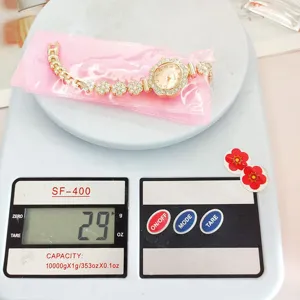 Fashion rhinestone women quartz watch with floral dial and chain strap for daily wear.