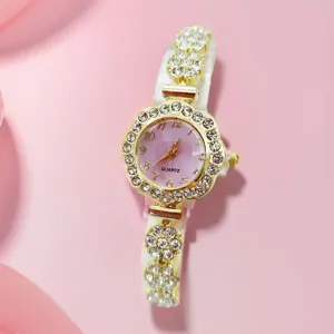 Fashion rhinestone quartz watch for women with floral bezel and sparkling crystal bracelet.