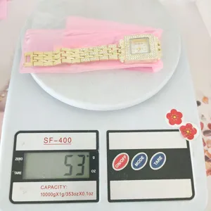 Details of luxury square rhinestone quartz watch for women, elegant gold wrist watch.