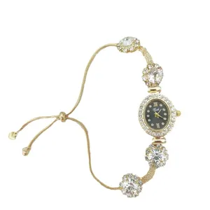 Elegante reloj de pulsera con diamantes de imitación para mujer, reloj de cuarzo dorado.