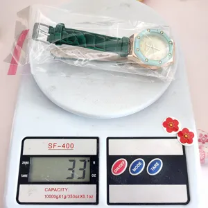 Orologio al quarzo da donna con cinturino in pelle verde e lunetta ottagonale casual
