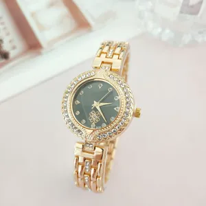 Elegante goldene Damen Quarz Armbanduhr mit Strass, grünem Zifferblatt und feinem Gliederarmband.