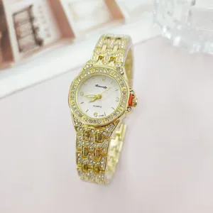 Luxury gold rhinestone women quartz watch detail, sparkling crystal steel strap timepiece.