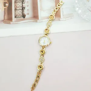 Damen Gold Quarz Uhr mit Strasssteinen elegantes Armband Luxus Mode Schmuck Damenuhr