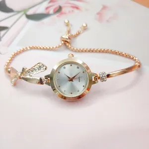 Elegant rose gold women quartz watch with bow rhinestone bracelet strap fashion timepiece.