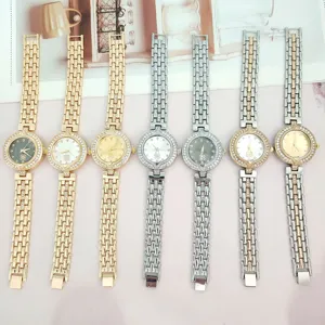 Damen Quarzuhr Luxus Strass Edelstahl Armbanduhr mit vierblättrigem Kleeblatt Design