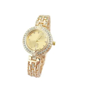 Elegante Damen Strass QuarzUhr mit goldenem Edelstahlarmband und funkelnder Kristall-Lünette.