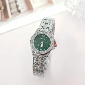 Rhinestone women quartz watch with green dial and silver steel strap for daily wear.