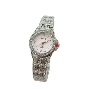 Women's rhinestone quartz watch with luxury steel strap, elegant diamond dial design.