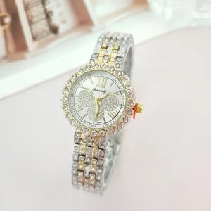 Elegant women quartz watch featuring a rhinestone bezel, two-tone steel strap, and dial.
