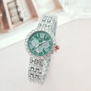 Women's silver rhinestone quartz watch with green dial and steel strap for daily elegance.