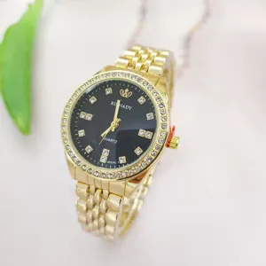 Orologio al quarzo dorato da donna con strass scintillanti e quadrante nero elegante.