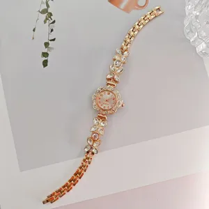Elegante Damen Gold Quarz Uhr mit funkelnden Strass Blumen Armband für den täglichen Gebrauch