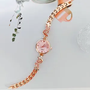 Damen Roségold Quarzuhr mit rosa Strass Schmetterling Armband elegante Modeuhr edel
