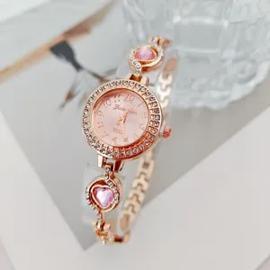 Orologio al quarzo donna oro rosa con strass brillanti quadrante rosa bracciale cuore