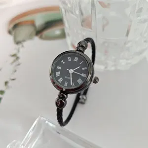 Reloj de pulsera mujer plateado cuarzo esfera negra números romanos estilo vintage