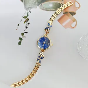 Elegante Damen Quarzuhr mit blauem Zifferblatt Kristall Schmetterling Armband Modedesign
