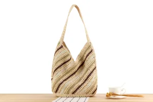 Handmade woven straw shoulder bag with diagonal colorful stripes, casual hobo tote for beach.