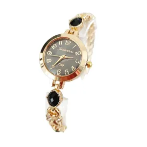 Elegant women's quartz bracelet watch with gold tone metal strap and black dial numerals.