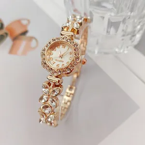 Detailansicht Damen Strass Quarzuhr, goldene Blumen Armbanduhr für elegante Frauen.