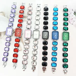 Close-up detail of women quartz watches featuring stunning colorful crystal stone chain straps.