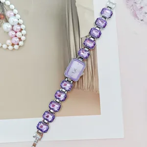 Exquisite purple crystal quartz watch for women, elegant gemstone bracelet detail view.