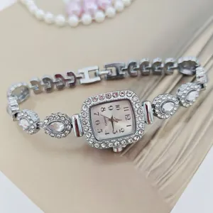 Elegante silberne Strass-Quartzuhr für Damen mit funkelndem Kristall-Armband-Design.