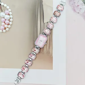 Women quartz watch with pink square dial and crystal gemstone link strap stylish design