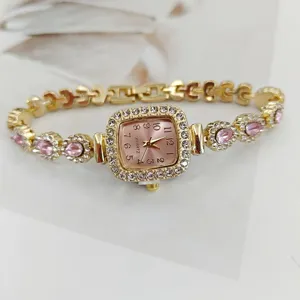Luxus quadratische Damenuhr Quarz rosa Zifferblatt Strass Lünette Kristall Armband.