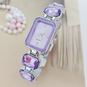 Purple rectangular crystal quartz watch for women with stylish geometric bezel and sparkly rhinestones.