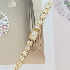 Elegant women quartz watch with crystal rhinestone link strap luxury fashion timepiece.