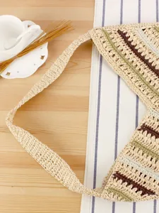 Handcrafted diagonal stripe straw woven shoulder bag, perfect for seaside holiday and daily fashion.