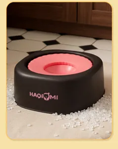Detail view of the anti-splash pet floating water bowl featuring a black and pink design.