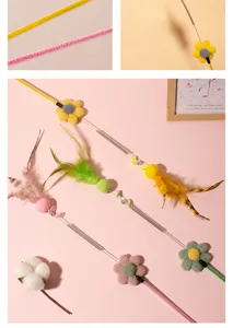 Vista detallada de varitas interactivas para gatos con resortes de acero, flores y plumas.