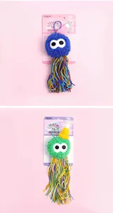 Plush cat toy with colorful yarn tassels and knit hat detail, pet interactive hanging toy.