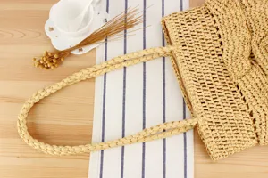 Handcrafted woven straw shoulder bag, casual everyday tote for beach vacation and daily commute.