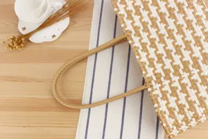 Woven tote bag for women, stylish beach shoulder bag with checkered design for casual daily use.