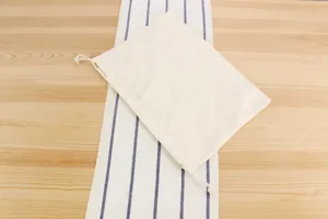 Plain cotton canvas drawstring storage pouch, simple style daily home organizer bag.