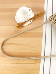 Handmade woven rope shoulder bag for women, minimalist beach vacation casual crossbody style.